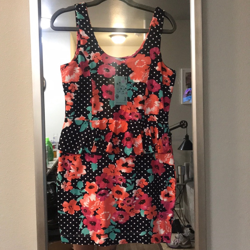 Fitted floral and polka dot peplum dress